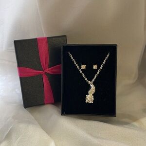 New in the box stamped NRT necklace and post earring set